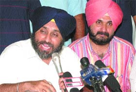 Mr Sukhbir Badal, general secretary, SAD, along with Navjot Singh Sidhu, BJP MP from Amritsar, talks to mediapersons in Jalandhar