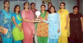 Dr Varinder K. Thind, Principal, Khalsa College for Women, gives prizes to the winners of inter-college debate competition in Ludhiana on Saturday
