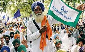 Bharatiya Kisan Union members hold a protest to press their demands 