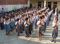 Schoolchildren in Mandoli village in Yamunanagar at a prayer meeting for Sanjay Dutt on Tuesday.