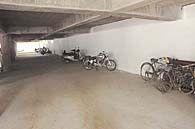 The nearby parking lot wears a deserted look