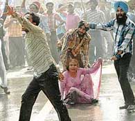 Protesting unemployed youths from Punjab face water cannon and lathi charge at Matka Chowk in Chandigarh on Thursday. 