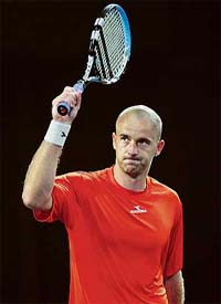 Croatias Ivan Ljubicic celebrates after beating Kevin Kim of the USA in the pre-quarterfinal of the China Open tennis tournament in Beijing