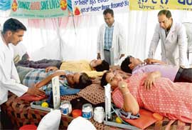 Volunteers donate blood at a camp in Sector 17, Chandigarh, on Friday. 