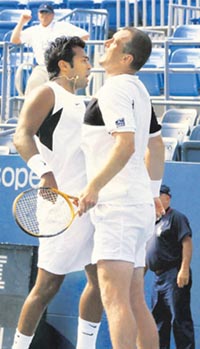 Leander and Martin Damm celebrate after winning the US Open title.