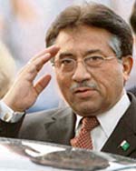Pakistans President Gen Pervez Musharraf gestures upon his arrival at Jose Marti Airport in Havana