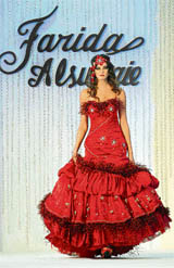 A model displays a dress designed by Kuwaiti designer Farida al-Subaie