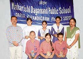 Winners of an essay writing competition at Maharishi Dayanand Public School, Daria