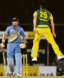 Australian pacer Mitchell Johnson celebrates after he clean bowled Indias Irfan Pathan during the tri-series one-dayer in Kuala Lumpur on Saturday.