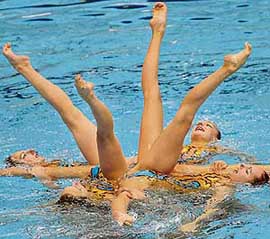Russian swimmers perform during the free routine team event in the Synchronised Swimming World Cup in Yokohama in suburban Tokyo on Sunday. Russia won gold medals in all four events and captured the World Cup.