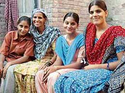Nirad Bala (second from left) with her three daughters at their home in the village of Shutrana in Patiala district.