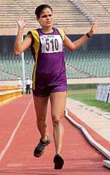 Leelamma Alphonso celebrates on winning the Indian Open Marathon in New Delhi on Sunday
