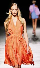 A model displays oufits by British designer Paul Smith at the London