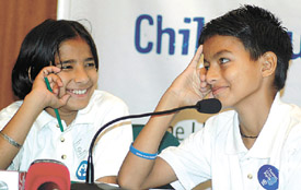 Archnan Bisht and Laxman Singh Negi, who represented India as child journalists at the United Nations Annual Day of General Discussion, during a press conference in the Capital on Tuesday. 