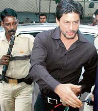Bollywood star Shah Rukh Khan arrives to attend the 14th AGM of Jet Airways in Mumbai on Wednesday.
