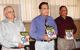 Dr R.C. Sobti, Vice-Chancellor, PU, releases a book on Aids and sex education at Punjab University in Chandigarh