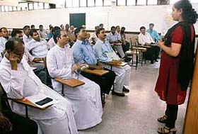 Ms Pooja Thakur, president of the Chandigarh Network of people living with HIV/AIDS, interacts with religious heads at a seminar at the Catholic Church, Sector 19, Chandigarh