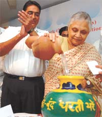 Delhi Chief Minister Sheila Dikshit inaugurating a rain harvesting project at Chittaranjan Park in the Capital on Wednesday.
