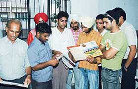 Students who have allegedly been cheated by the management of Guru Nanak College of Law in a state of shock in Ludhiana on Wednesday.