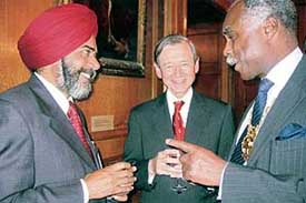 Dr Bernard Ribeira right, president, Royal College of Surgeons, England, talks to Dr Kuldip Singh, president, IAGES, while Dr Chris Russell looks on