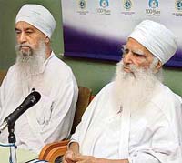 Dr Khem Singh Gill, vice-president of the Kalgidhar Trust, and Mr Iqbal Singh, president of the trust, during a press conference at the Chandigarh Press Club on Thursday.