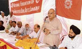 Mr Islam Ahmed, general secretary of the National Federation of Telecom Employees of BSNL, addresses a meeting of the district executive in Ludhiana on Thursday.