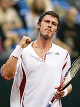 Russias Marat Safin reacts after defeating Andy Roddick of the US in a semifinal match of the Davis Cup in Moscow on Friday