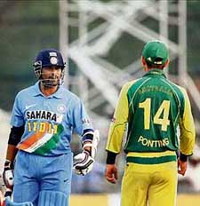 Sachin Tendulkar having a talk with Ricky Ponting after being called back by the umpire after he was declared caught behind during a the tri-series ODI match in Kuala Lumpur 
