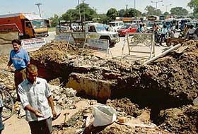 Motorists try to get past one another on the choked Sector 26 Transport Chowk intersection, where workers of the Chandigarh Municipal Corporation took on the repair of underground services