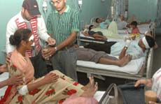 Injured devotees receive treatment at Janta Hospital at Jalandhar on Saturday. 