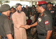 Magsaysay Award winner Rajendra Singh is welcomed by the General Officer Commanding of Vajra Corps, Lt-Gen Noble Thamburaj, during the concluding session of the two-day Nature Conservation Festival organised in Jalandhar Cantonment on Saturday. 