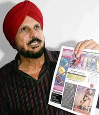 Triple jumper Mohinder Singh Gill displays his sports credentials during an interaction with The Tribune in Chandigarh