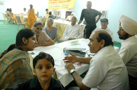 Doctors examine patients at a medical and diabetes check-up camp organised by the Lions Club in Ludhiana on Sunday