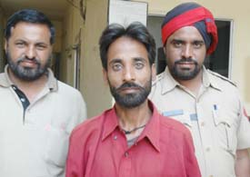 The accused Gurbachan Singh in police custody