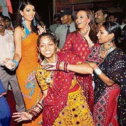 Actors Yukta Mookhy and Ishita Arun join all-night garba dancers on the first night of the nine-day Navratri festival in Mumbai