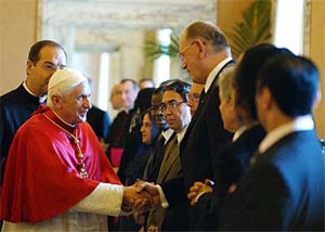 Pope Benedict shakes hands with ambassadors of Islamic nations and Italian Islami leaders in a room at his summer residence of Castelgandolfo, outside Rome on Monday.