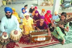 Blind couple teaches young students at the Guru Nanak Mission Netraheen Vridh Ashram at Phagwara. 