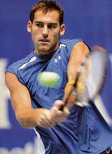 Robby Ginepri of the USA in action against Kenneth Carlsen of Denmark during the Thailand Open in Bangkok on Tuesday