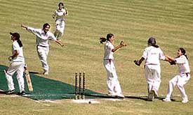 Pinegrove players celebrate after the fall of a wicket during the 6th All-India IPSC Girls Cricket Tournament at Dharampur on Tuesday