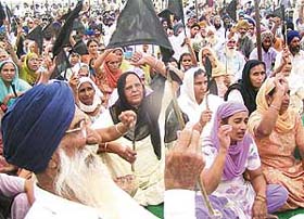 Farmers protest at a rally near Chila village in Mohali