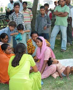Family members of the murdered girl mourn at Dashmesh Avenue on the Mithapur-Cantonment Road in Jalandhar