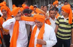 Members of various social organisations tying turbans while getting ready for Shaheed Bhagat Singh's birth anniversary celebrations in Jalandhar 