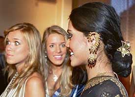 Miss India Natasha Suri (right) is pictured during a ceremony at the Chinese Embassy in Warsaw on Tuesday.