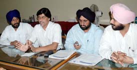 Mr Harish Rai Dhanda, chairman, legal cell, SAD, addresses mediapersons in Ludhiana on Friday