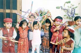 Students of Small Wonder Nursery School, Ludhiana, enjoy dandiya at a function held in school on Friday
