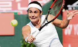 Spains Virginia Ruano Pascual returns a shot to Sania Mirza during the quarterfinal of the Korea Open in Seoul on Friday