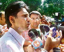 A Jalandhar-based lawyer, Anshu Sharma, who had called a press conference in connection with the Jessica Lal murder case, being confronted by mediapersons at the Press Club in Chandigarh on Saturday.