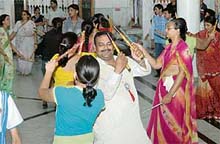 Members of the Gujarati Samaj enjoy Dandiya on the premises of Lakshmi Narayan Temple, BRS Nagar, Ludhiana, on Saturday.
