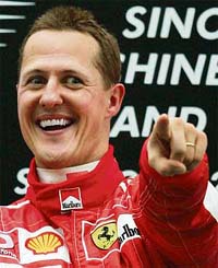 Ferraris Formula One driver Michael Schumacher of Germany celebrates after winning the Chinese Grand Prix in Shanghai