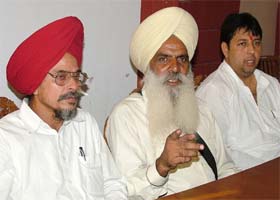 Former MLA, Mr Tarsem Jodhan, murder victims father, Mr Amrik Singh, and lawyer, Mr Shashi Sharma, in Jalandhar